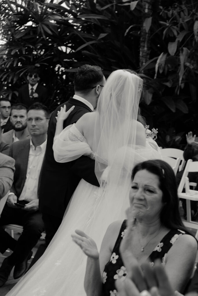 Couple walking down the aisle after getting married